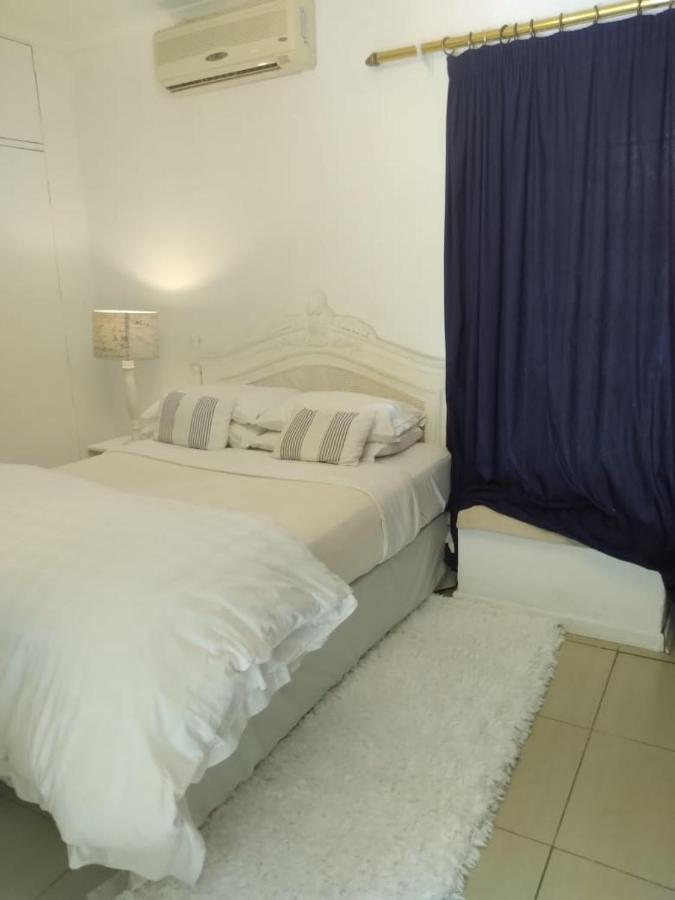 Amethyst Suites Springs  Bagian luar foto